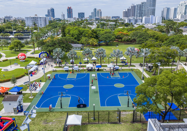 Aerial view of community sports courts and play spaces